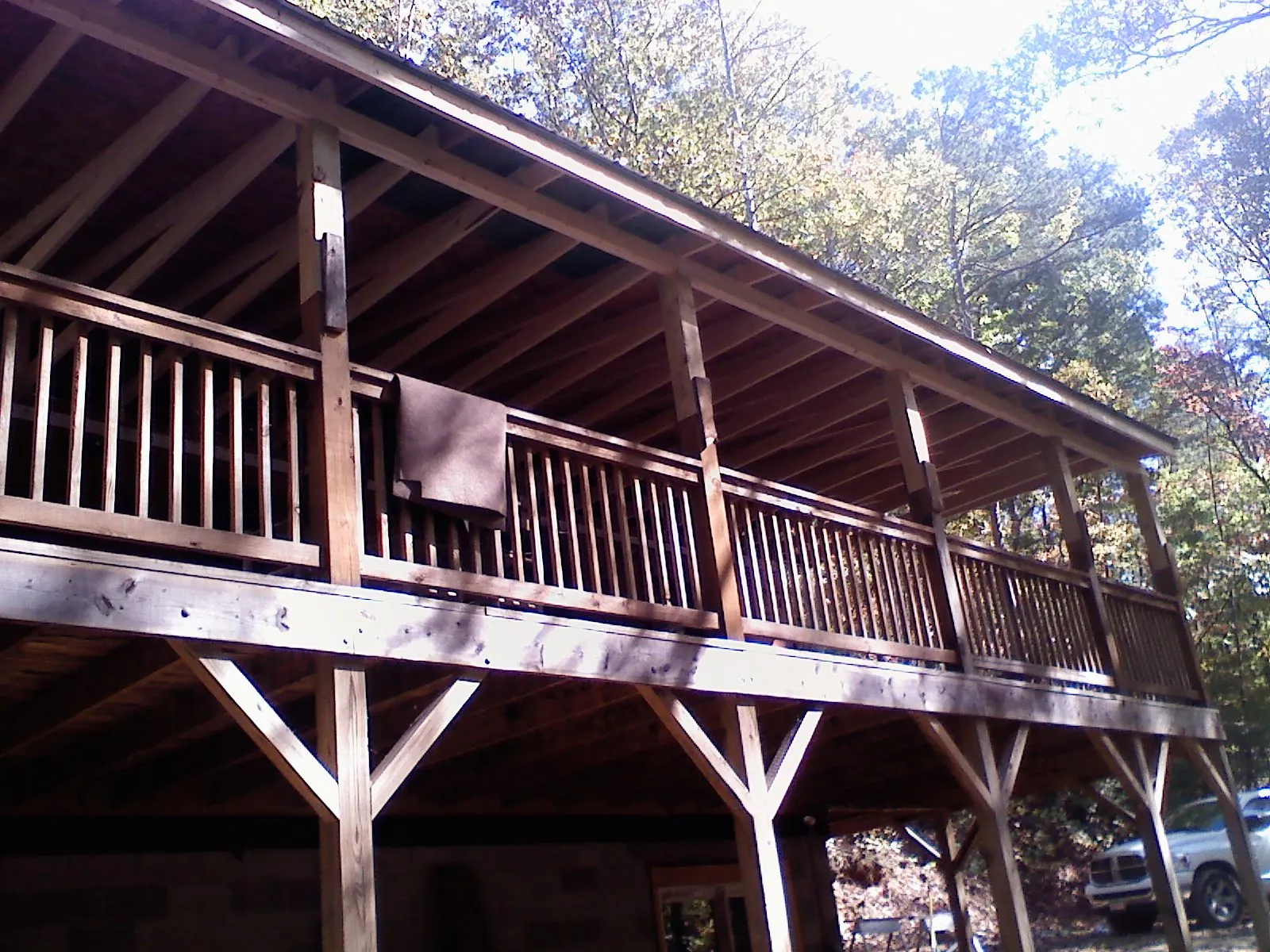 Timber framing under a new elevated porch and deck — Roof Leak Repair in Masontown by Roofing Brothers